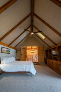WhaleBeing Mental Health & Wellness Yoga Retreat - bedroom inside the mountain cabin